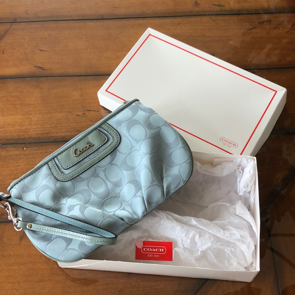 Coach clutch purse with wrist strap